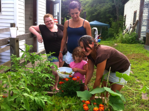 a family gardening in their yard